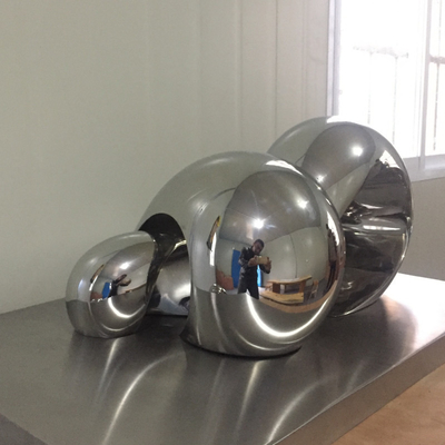 O espelho abstrato das esculturas da decoração da casa do OEM lustrou a escultura de aço inoxidável