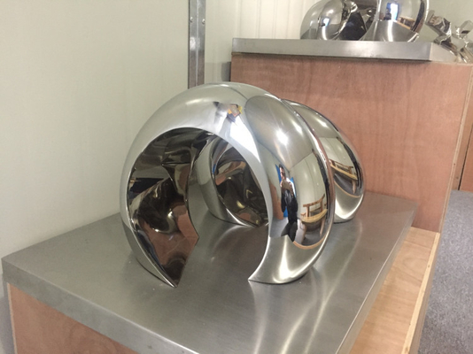 O espelho abstrato das esculturas da decoração da casa do OEM lustrou a escultura de aço inoxidável