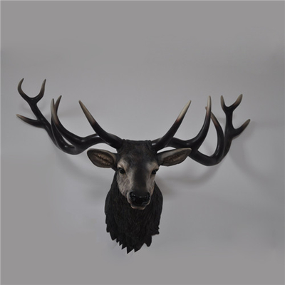 As esculturas animais principais da decoração da parede dos cervos que penduram o estilo do vintage personalizaram