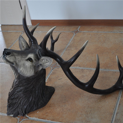 As esculturas animais principais da decoração da parede dos cervos que penduram o estilo do vintage personalizaram